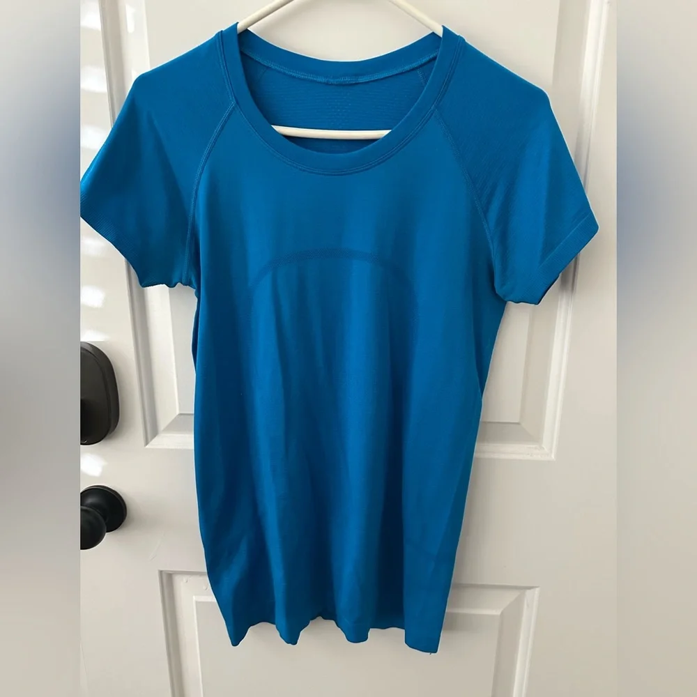 Swift tech shirt hip length size 8